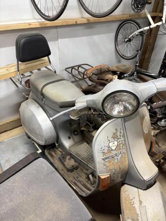 This is a shot of a vespa p200e for sale