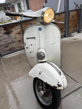 This is a photograph of a 1978 vespa 50 special w/ 135 malissa engine