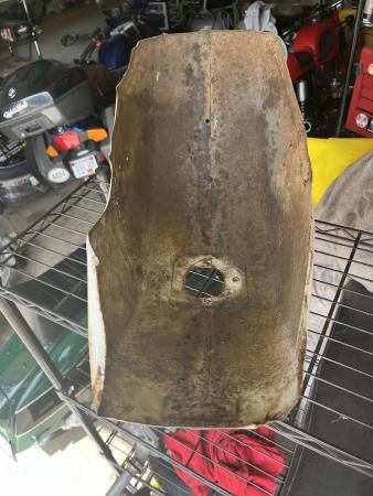 This is a still of a battered p200 mudguard