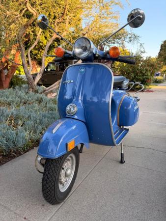 This is a pictorial representation of a 1974 vespa super 💥 one owner ⚡️ original paint