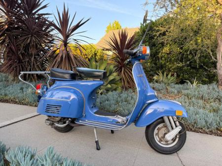 This is a depiction of a 1974 vespa super 💥 one owner ⚡️ original paint
