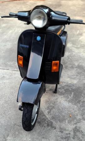 This is a photograph of a 1993 piaggio vintage vespa hp4