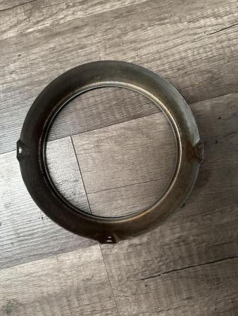 This is a snapshot of a vespa cev headlight rim