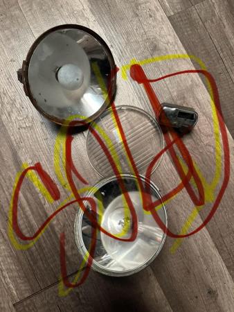 This is an image of a vespa cev headlight sold