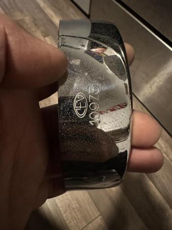 This is a representation of a vespa cev headlight rim 