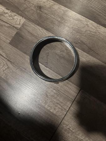 This is a photograph of a vespa cev headlight rim 